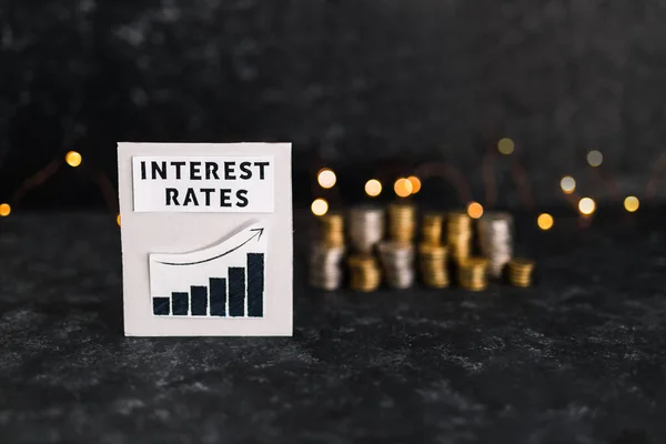 Interest Rates Text Graph Showing Stats Going Front Stacks Coins — Stock fotografie