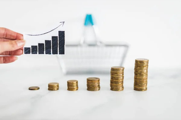 Rising Inflation Graph Front Shopping Basket Growing Stacks Coins Representing — Stock Photo, Image