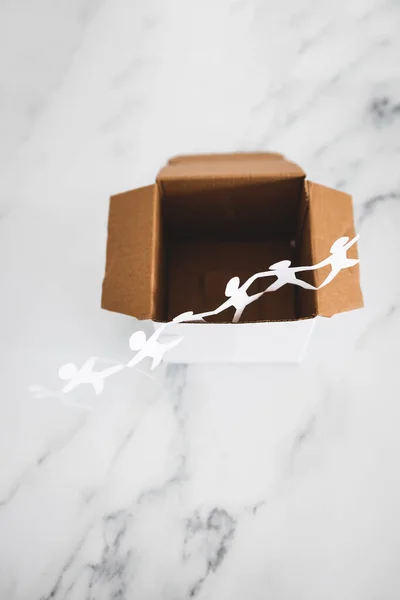 Think Box Concept Paper People Chain Getting Out White Box — Zdjęcie stockowe