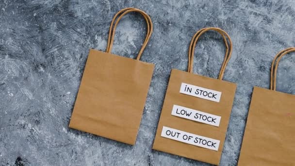 Stock Low Stock Out Stock Texts Top Shopping Bags Concept — Stockvideo