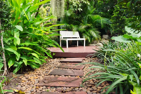 Garden Walkway foot path and bench chair. — Stock Photo, Image