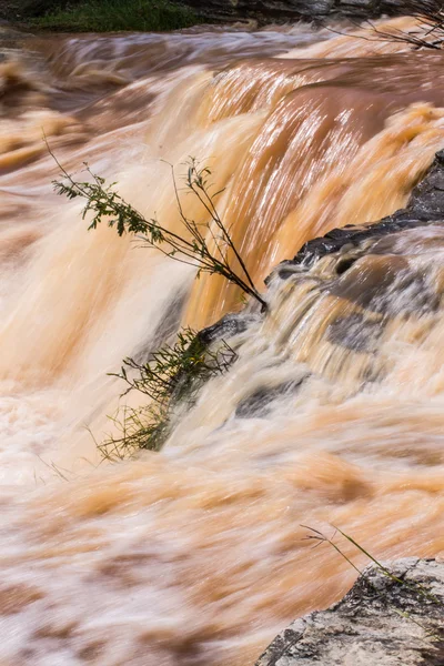 Rode water stroom detail — Stockfoto