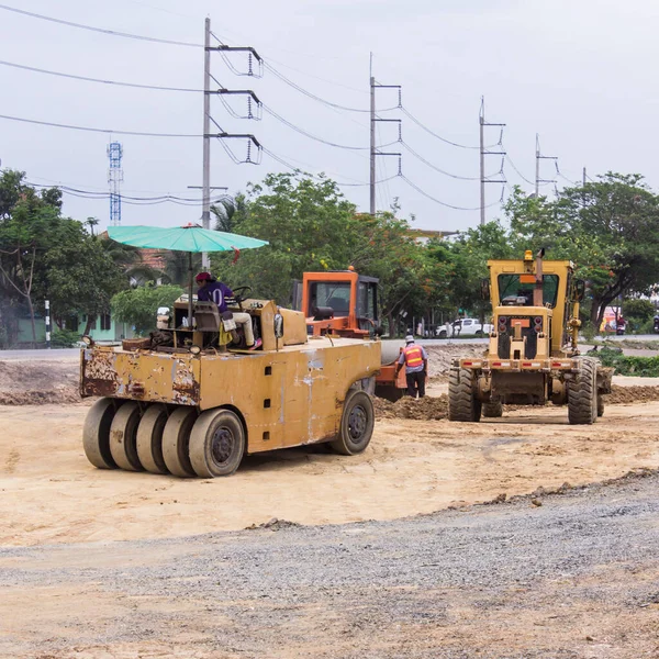 stock image Steamroller with Tractor road roller leveling