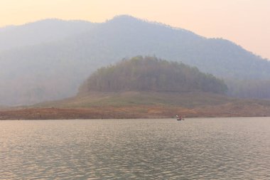 people paddling in Maengad dam, Chiangmai Thailand