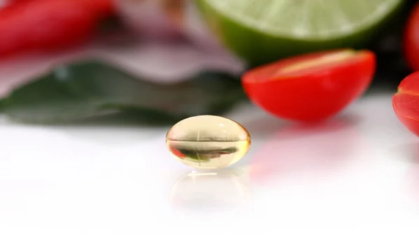Pílulas de óleo de ervas medicinais — Fotografia de Stock
