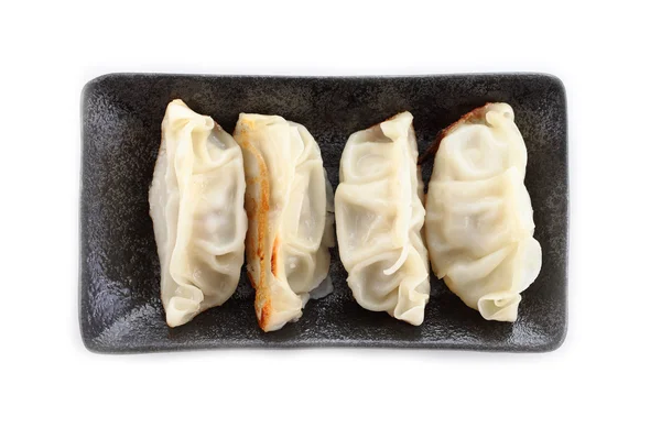 Dumplings japoneses com fundo branco Imagem De Stock