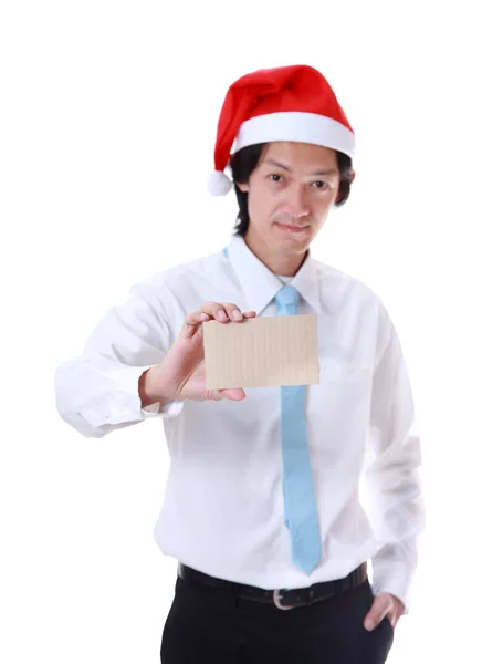 Empresario manos sosteniendo papel, banner de cartel en blanco de Navidad . — Foto de Stock