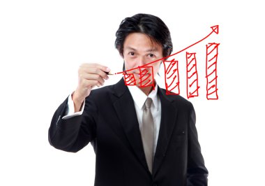 işadamı ile bir altın elbiseli tutarak bir kalem ve wr renk kravat