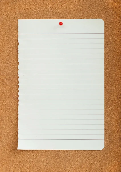 White paper with red pin on cork board — Stock Photo, Image