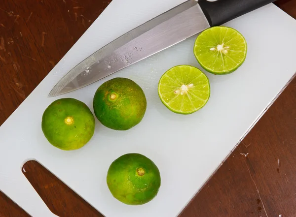Limes en mes. op een houten — Stockfoto