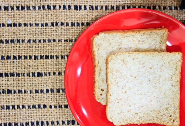 Pão na mesa de madeira — Fotografia de Stock