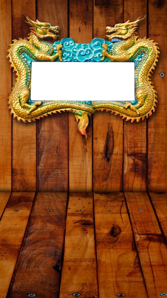 Dragon plate wood background — Stock Photo, Image