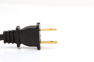 beyaz izole arka planda elektrik fişi.