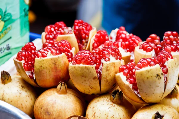 A fruit Ripe pomegranates background — Stock Photo, Image