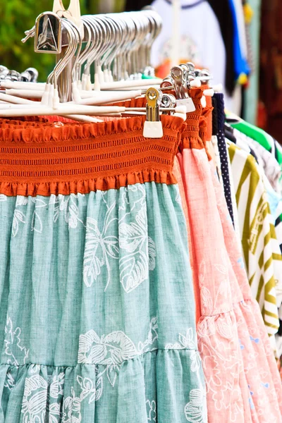 Colors of rainbow. Variety of casual skirts on hangers — Stock Photo, Image