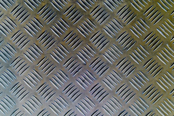 Metal with repetitive patten backgound — Stock Photo, Image