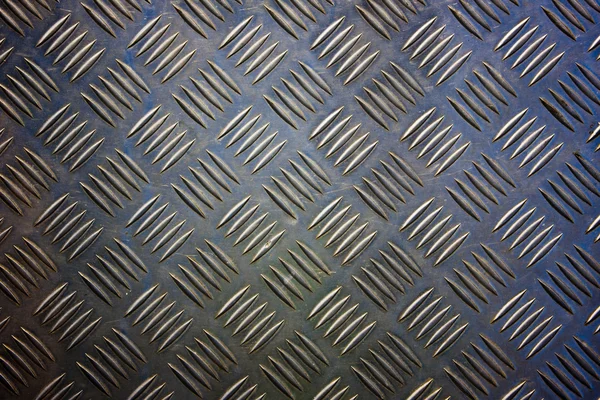 Metal with repetitive patten backgound — Stock Photo, Image