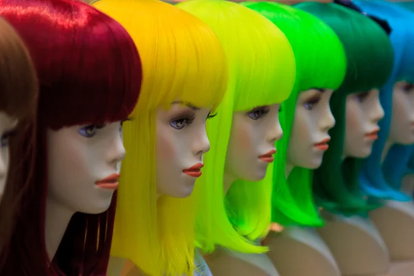 Mannequin with colorful wig and facial accessories — Stock Photo, Image