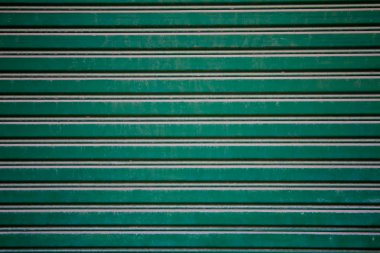 oude groene stalen deur.