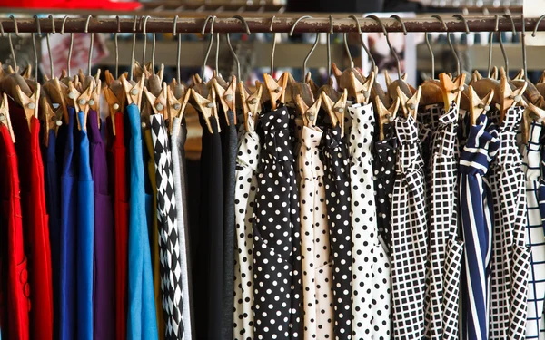 Colors of rainbow. Variety of casual shirts on hangers — Stock Photo, Image