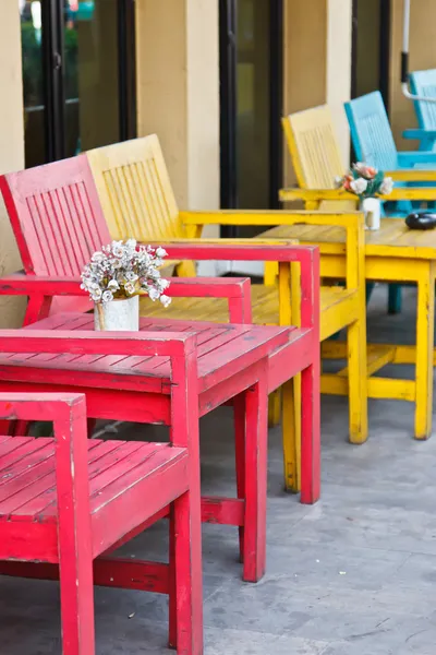 Table with chair in food store — Stock Photo, Image