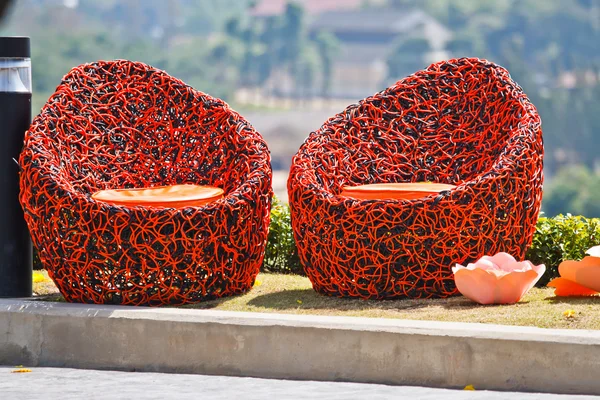 Red chair in a garden — Stock Photo, Image