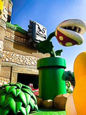 OSAKA, JAPONYA - 10 Nisan 2021: Yoshi 's Adventure' daki sahne, Super Nintendo World. Nintendo World 'de bir cazibe merkezi..