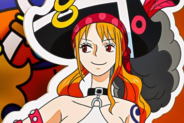 Osaka, Japonya - 6 Ekim 2022: One PIECE FİLM RED 'den NAMI anime karakterlerinin fotoğrafları. Film tanıtımının bir parçası olarak Osaka Metro pul mitinginde