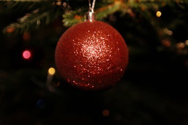 Brown balls hanging on the Christmas tree