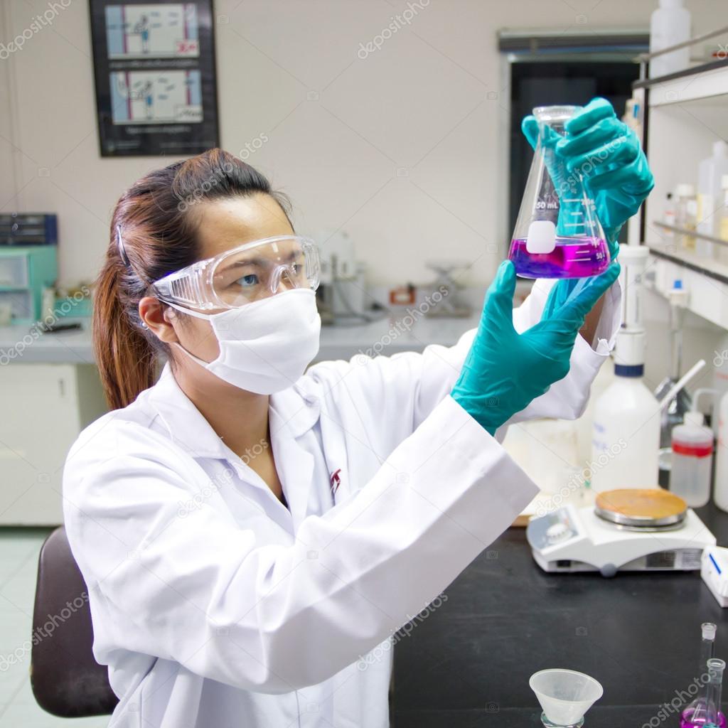Female researcher carrying out research in a chemistry lab