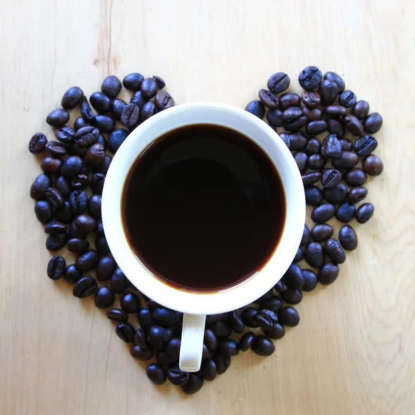Cup of fresh coffee on table, view from above — Stock Photo, Image