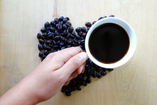 Tasse frischen Kaffee auf dem Tisch, Blick von oben — Stockfoto