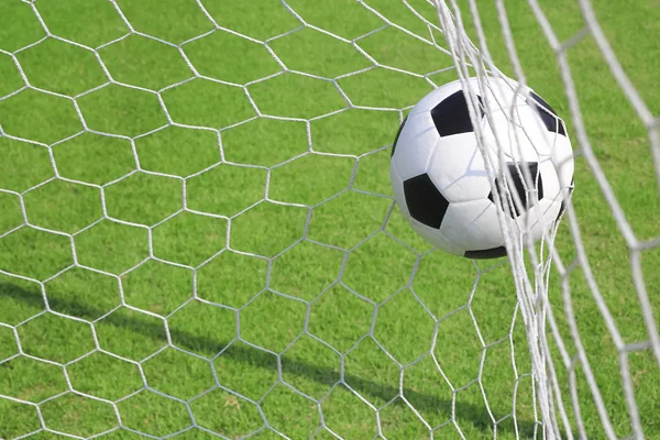 Soccer ball in goal — Stock Photo, Image