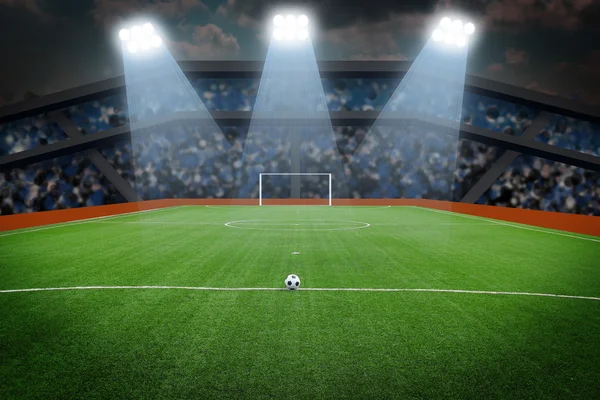Balón de fútbol en el campo en el estadio por la noche —  Fotos de Stock