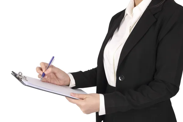 Kobieta stojąc i sporządzenie listy w jej biurze na białym — Zdjęcie stockowe