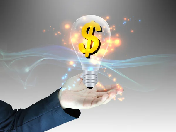 Light bulb and Us dollar in hand — Stock Photo, Image