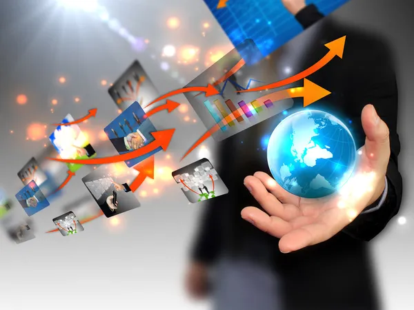 Businessman holding world, connected Stock Photo