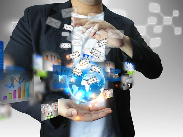 Businessman holding a glowing, connected — Stock Photo, Image