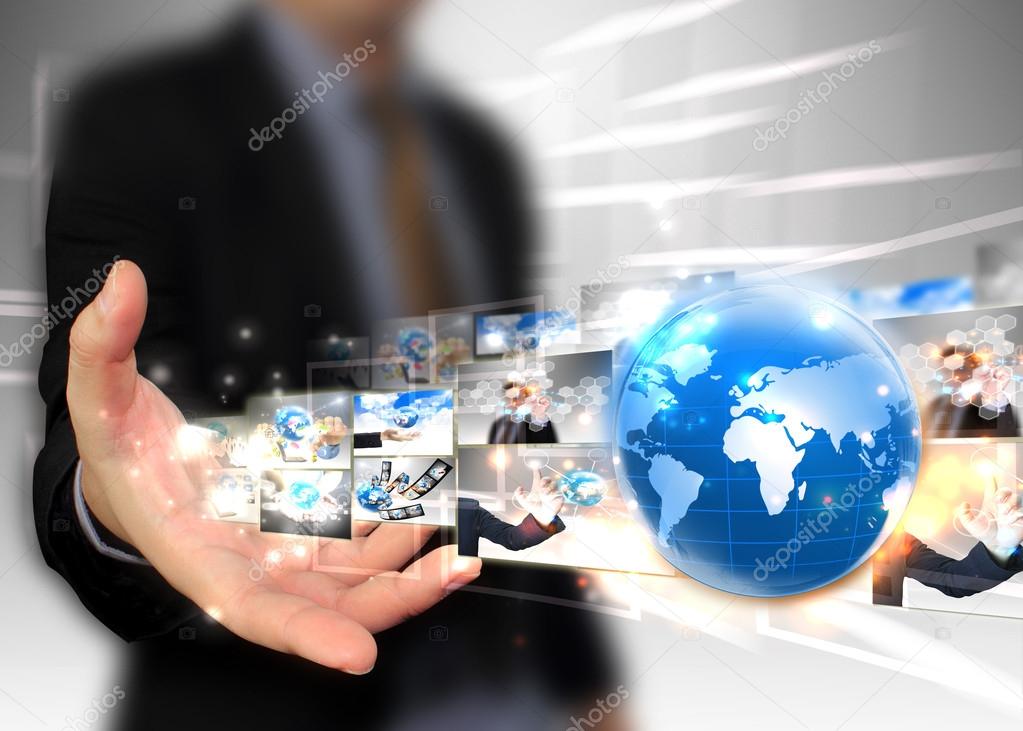 Businessman holding world .Technology concept