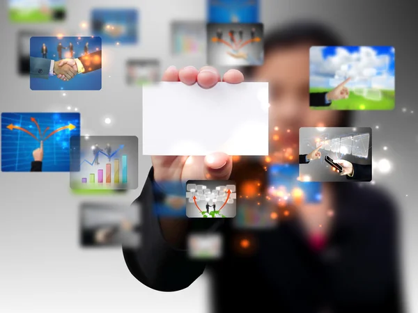 Businesswoman holding a business card — Stock Photo, Image