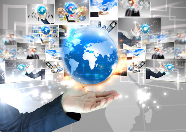 Businessman holding world .Technology concept