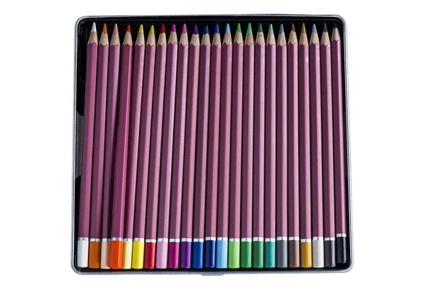 A set of brightly colored wooden slate pencils in metal tin box. — Stock Photo, Image