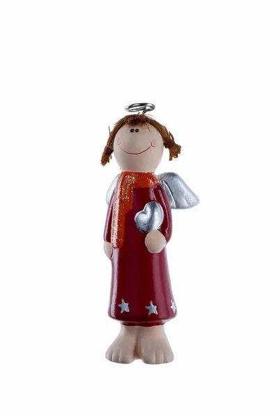 Figura de cerámica de un ángel con un halo y un corazón en las manos de un vestido rojo y bufanda naranja con lentejuelas. juguete árbol de Navidad . — Foto de Stock