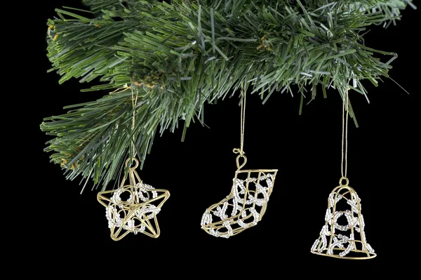 Tři vánoční hračky, boty bell, hvězdička. Stock Obrázky