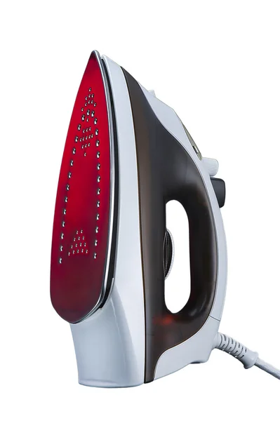 Modern electric iron, white and brown. With burning red light. — Stock Photo, Image