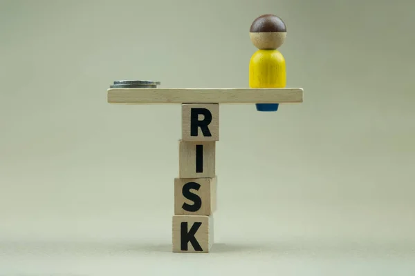 Money Wooden Human Figures Placed Balancing Wooden Cubes Text Risk — Stockfoto