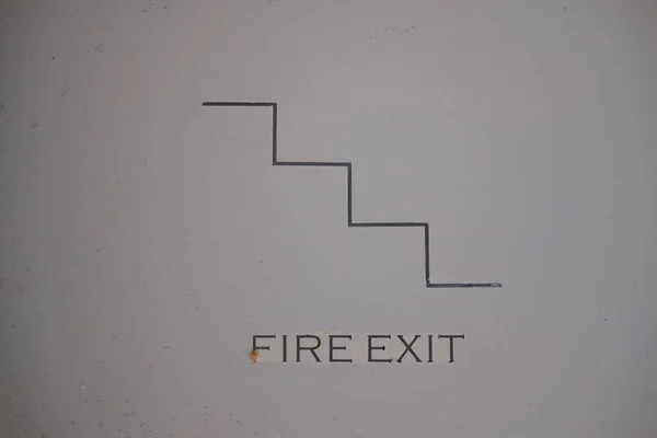 Fire exit door icon on wall. Fire evacuation and warning system equipment for emergency.