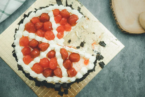 Delicious berry cake, a sweet pastry cake is cut one piece the cake, a sweet pastry cake