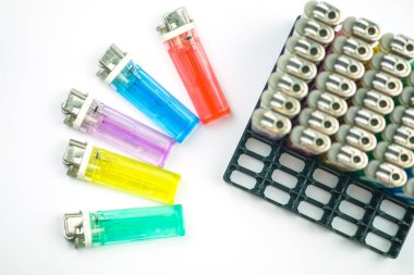 Multicolored gas lighter in package for sale. Close up