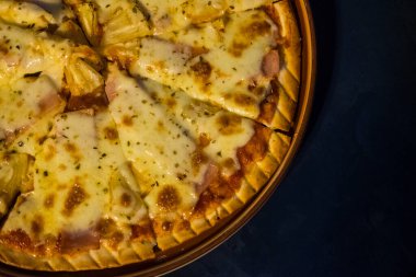 Pizza margherita top, ready taking slice of pizza, overhead view